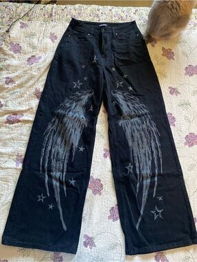 Hot Topic Black Jeans with Grey Wing and Star Graphics